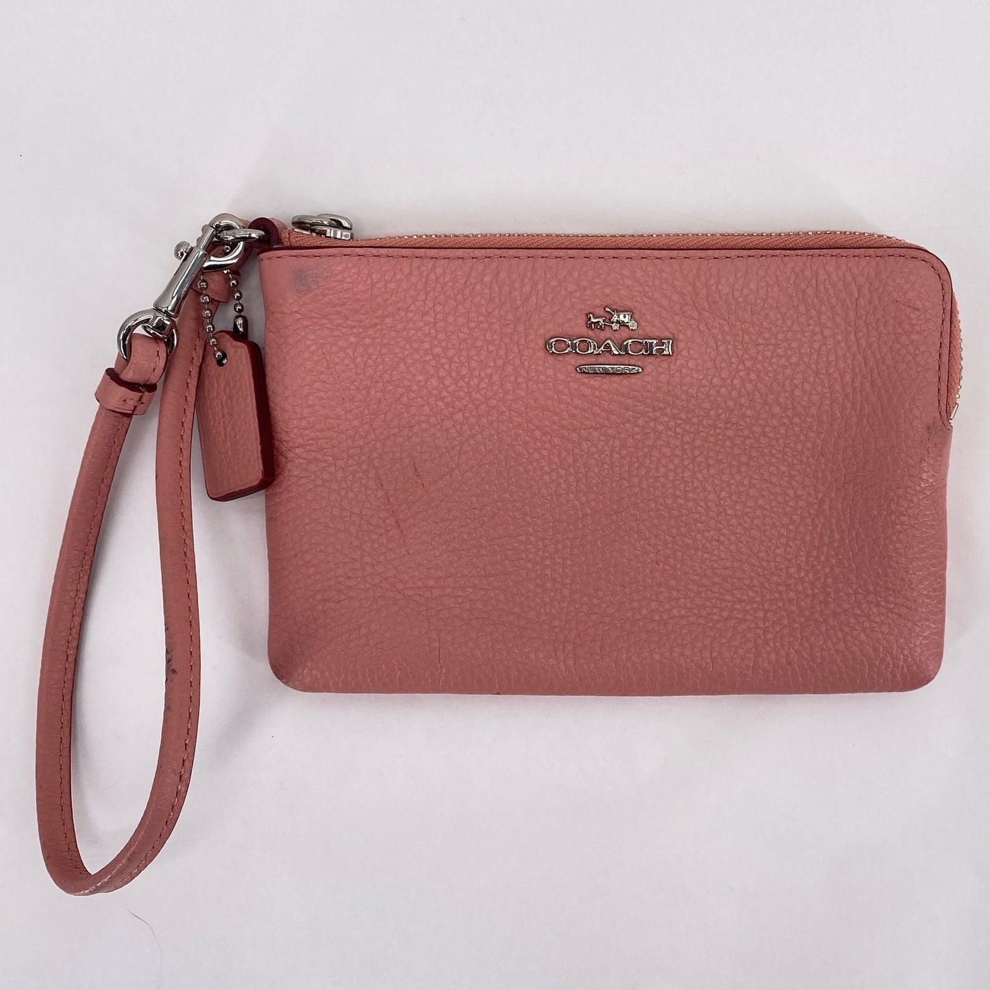 Peach COACH Leather Wristlet