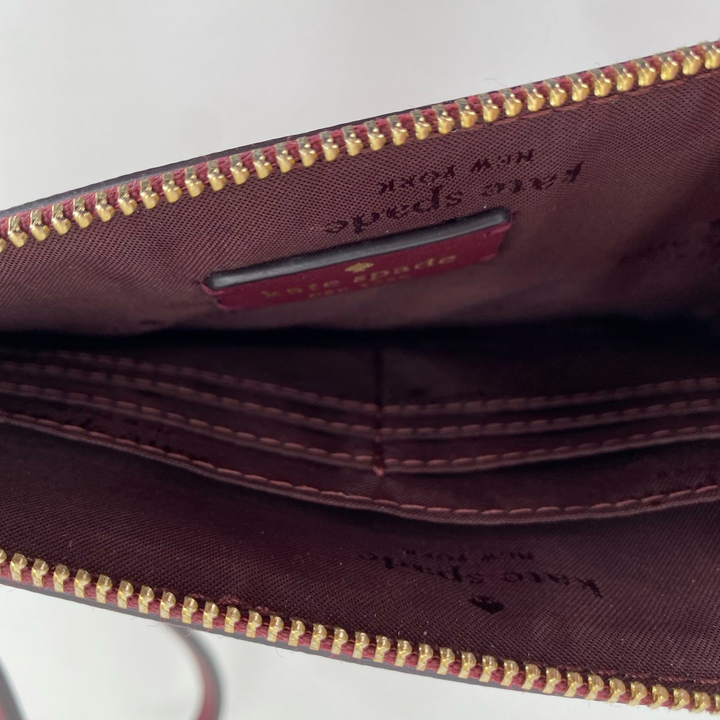 WINE KATE SPADE Wristlet