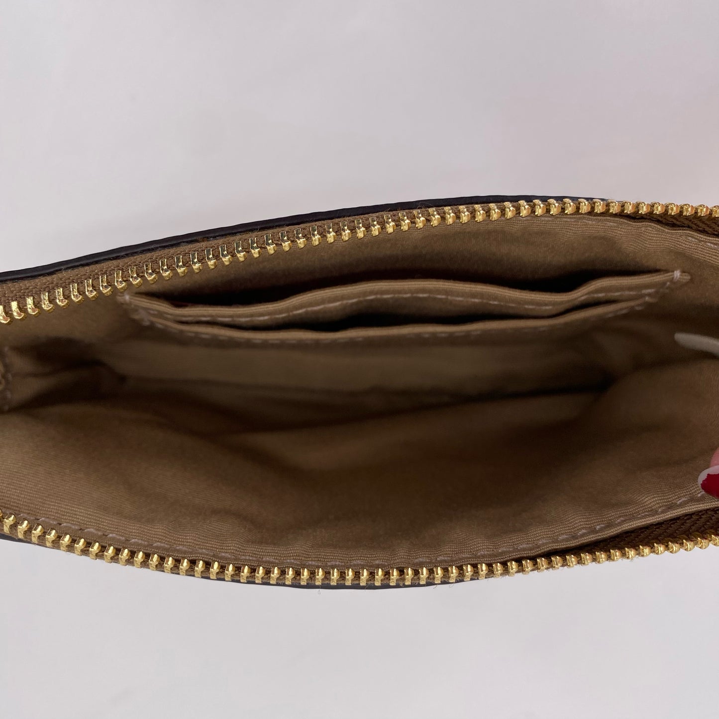 Beige COACH Wristlet