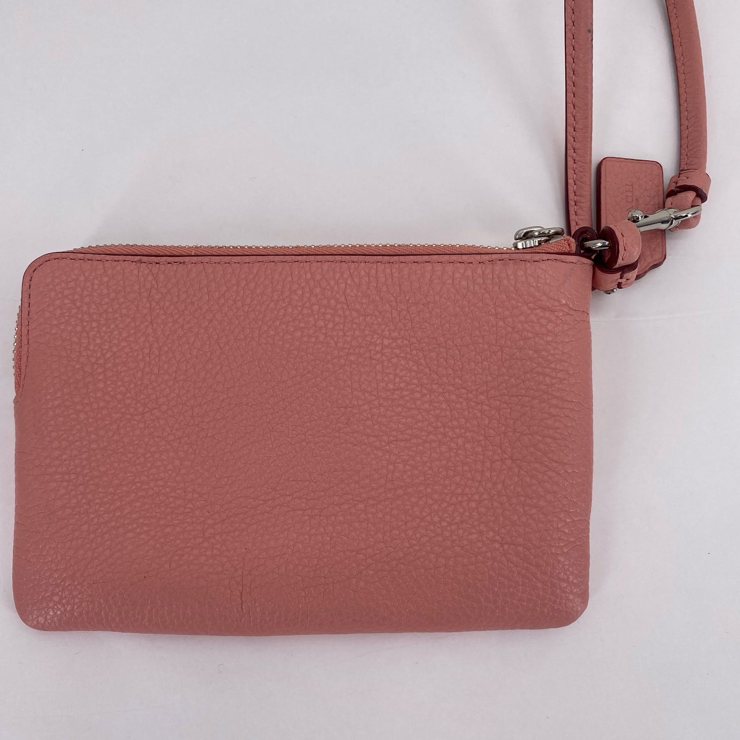 Peach COACH Leather Wristlet