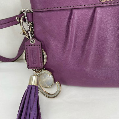 Purple COACH Wristlet