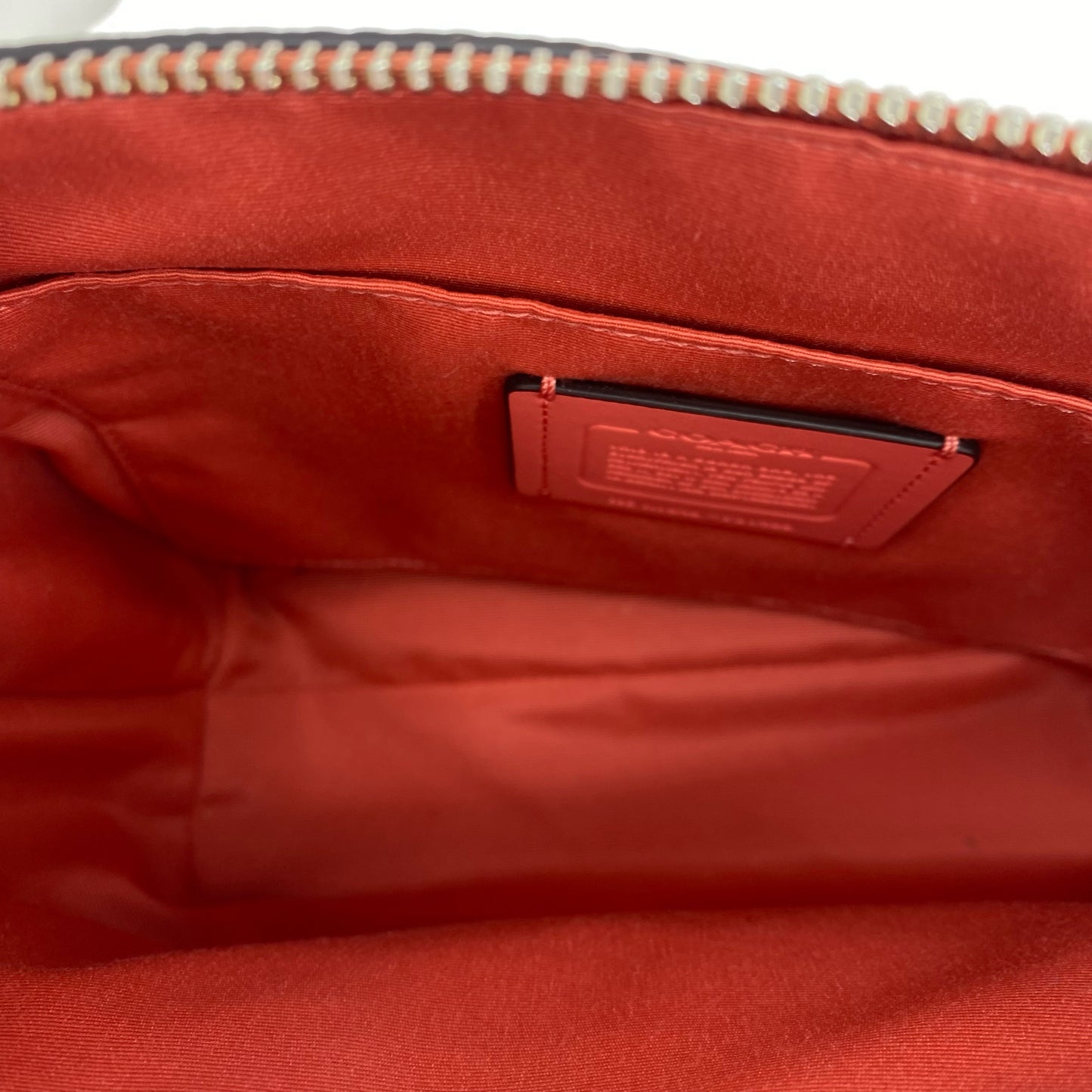 SALMON COACH Leather Pebbeled Leather Cross-body