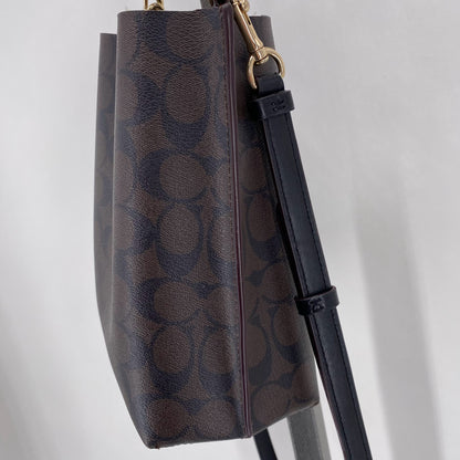 BLACK/BROWN COACH Cross-body