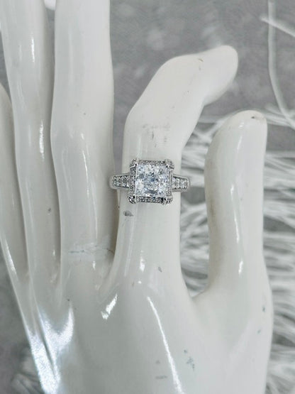 "Royale Saintess" Princess Cut Diamond Engagement Ring Set in Sterling Silver.