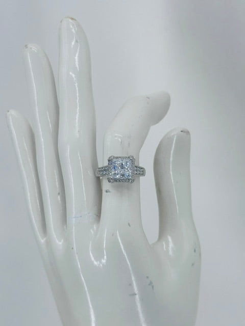 "Royale Saintess" Princess Cut Diamond Engagement Ring Set in Sterling Silver.